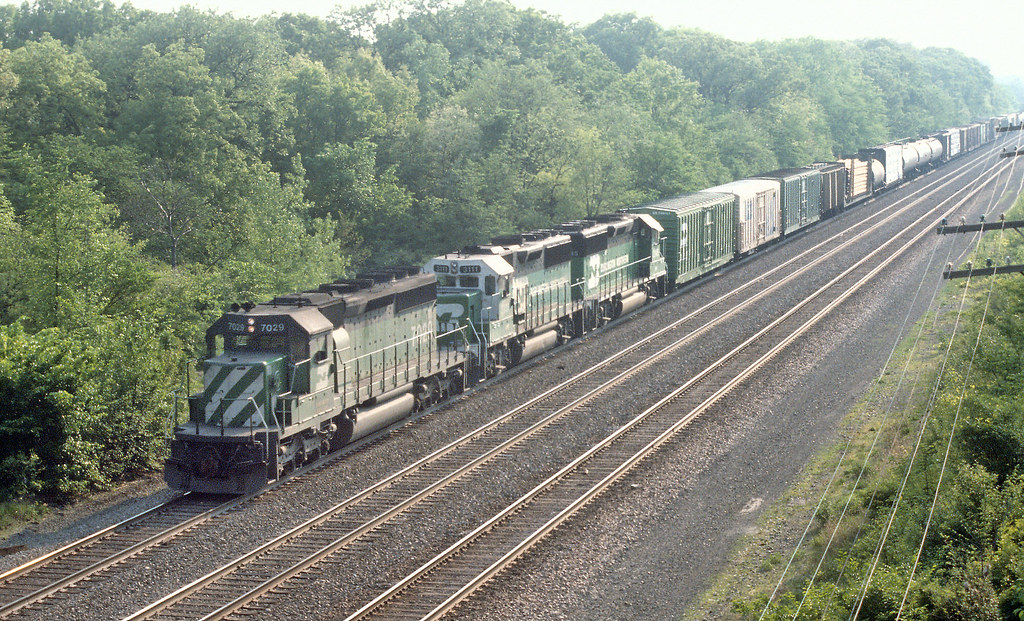 BN SD40-2 7029 and GP50 3111 with a mixed freight in Lisle… | Flickr