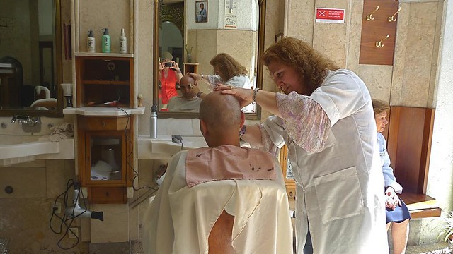 #TBT: Farzad getting cleaned up at a beautiful old barber shop in Porto, Portugal ~ May 2009 💈 #barbers #barbershop #porto #portugal #europe #oldschool #barbering #history #tradition #craft #worldbarbershops #internationalbarbers