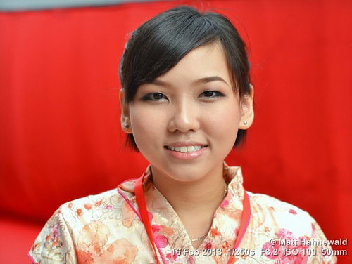 portrait beautiful beauty smiling festival female character teeth traditional ethnic cultural posing primelens travel authentic red street eyes asia matthahnewaldphotography face facingtheworld chinesedress chinesenewyear horizontal head malaysia malaysianchinese nikond3100 outdoor penang southeastasia chinese 50mm cheongsam expression headshot nikkorafs50mmf18g fullfaceview colourful colour clarity person closeup consensual oriental lookingatcamera georgetown