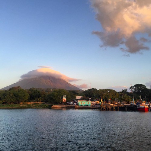 We took a slow, beautiful ferry ride across the lake from San Jorge to Moyogalpa port on the island of Ometepe. That's Volcano Concepcion in the background. by mjlevittation, square squareformat iphoneography instagramapp uploaded:by=instagram