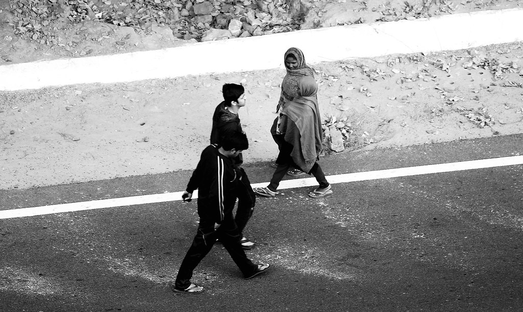 IMG_0524 | People walking the road on a wintry evening in In… | Flickr