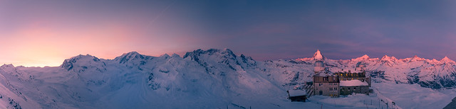 the sun rising behind Monte Rosa