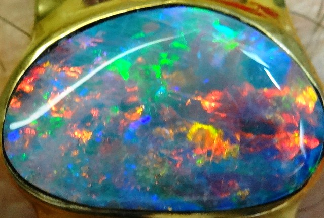 Solid Opal from Coober Pedy, Australia.  2.5 carat, harlequin pattern..