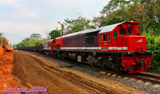 Sumatera long coal freight departing from Cempaka