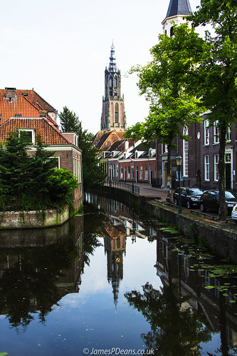 netherlands plants nature reflection industry utrecht clock amersfoort canals trees roadvehicles car cars tree landscape tower spire architecture publicutilities water europe transporttransportinfrastructure thenetherlands nl digital downloads for licence prints sale man who has everything james p deans photography