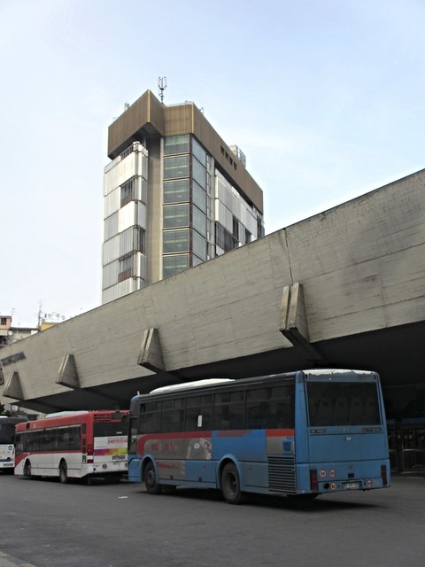 Buses at portico of Porta Nolana station, Circumvesuviana, Naples, Italy
