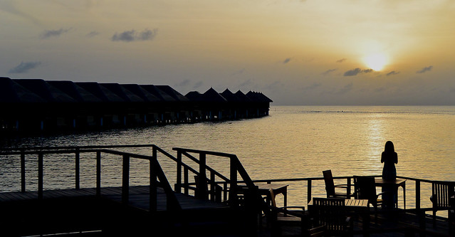 Sunrise and a girl,  Maldives Coco Boduhithi