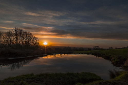 light sky water sunrise reflections silhouettes malvernhills peachfieldcommon