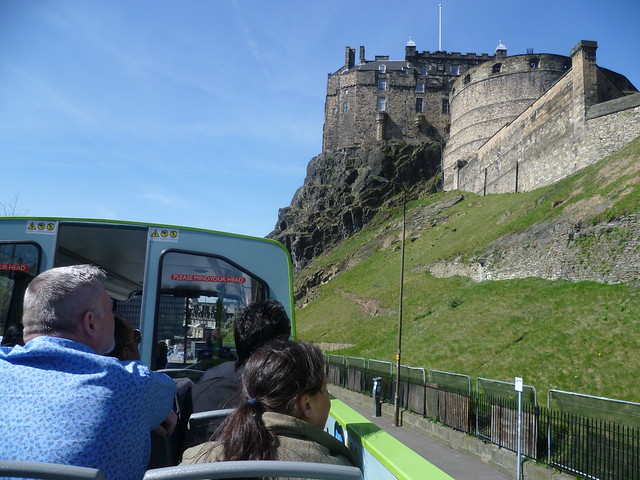 Sightseeing by bus in Edinburgh provides good views of the Castle.