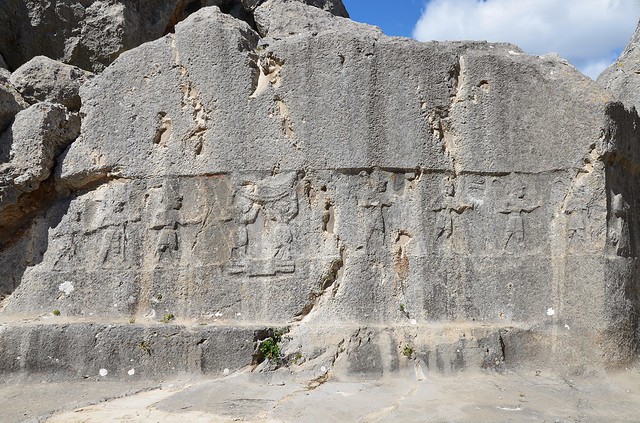 Chamber A, two bull men stand between male gods on the hieroglyphic symbol of the earth and supporting the sky, Yazılıkaya, the Hittite sanctuary of Hattusa, Turkey