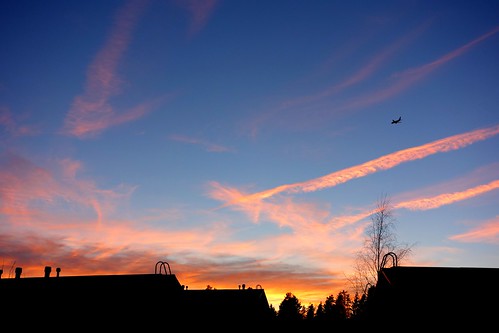 blue orange silhouette clouds plane finland evening skies roofs kerava sakarip