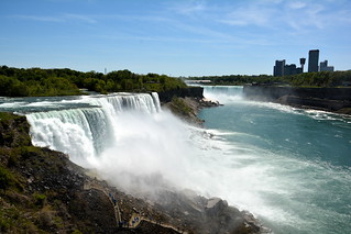 The American Falls with Horseshoe Falls in the background, and visitors