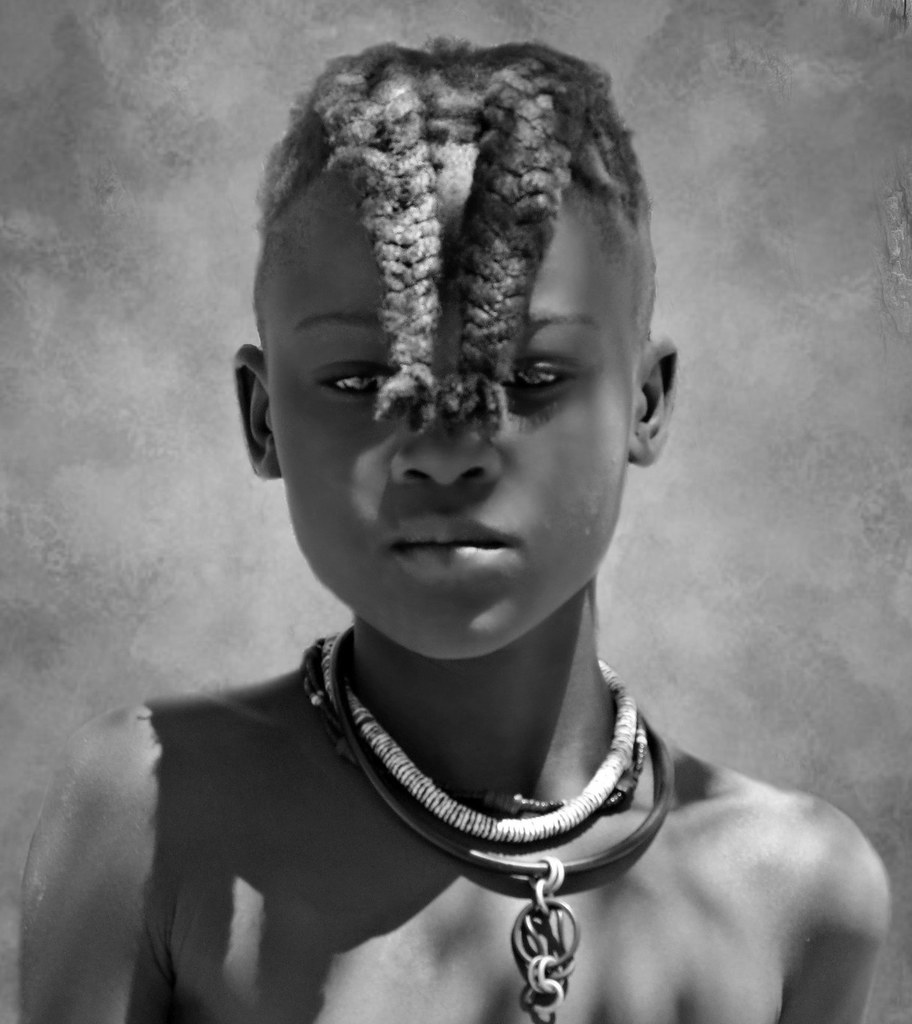 A Young Himba Girl Wearing The Pre Puberty Hair Style Of T
