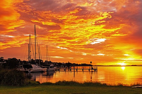 reflection water clouds sunrise pier stormy yachts lakemacquarie wangi