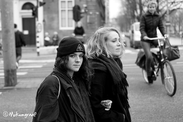 Arm in arm through the streets of Amsterdam