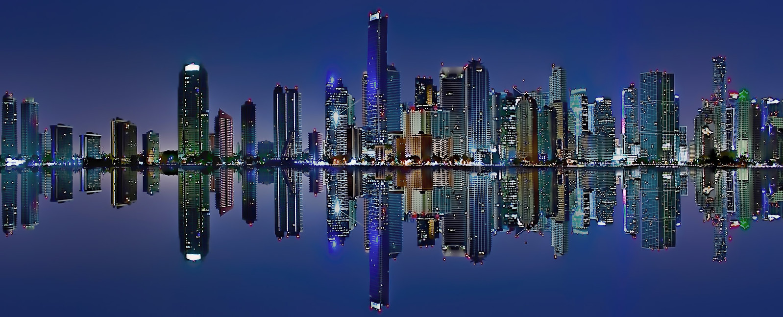 The skyline of Miami, Florida, U.S.A. along Biscayne Bay at the Blue Hour.