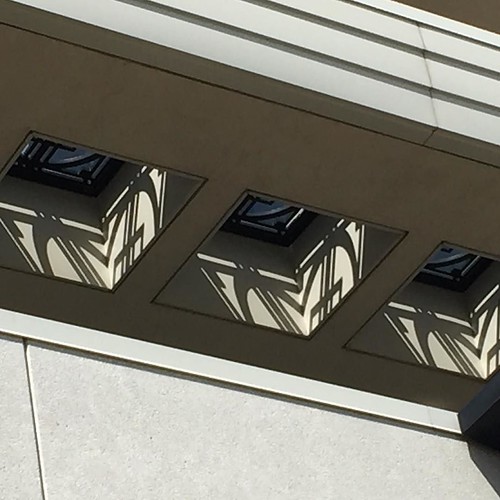 The glorious sunshine + a nifty Prairie Style architectural detail on our Central Library building create this cool shadow effect on days like today. #architecture #prairiestyle #shadow #sunshine #schaumburg | by STDL