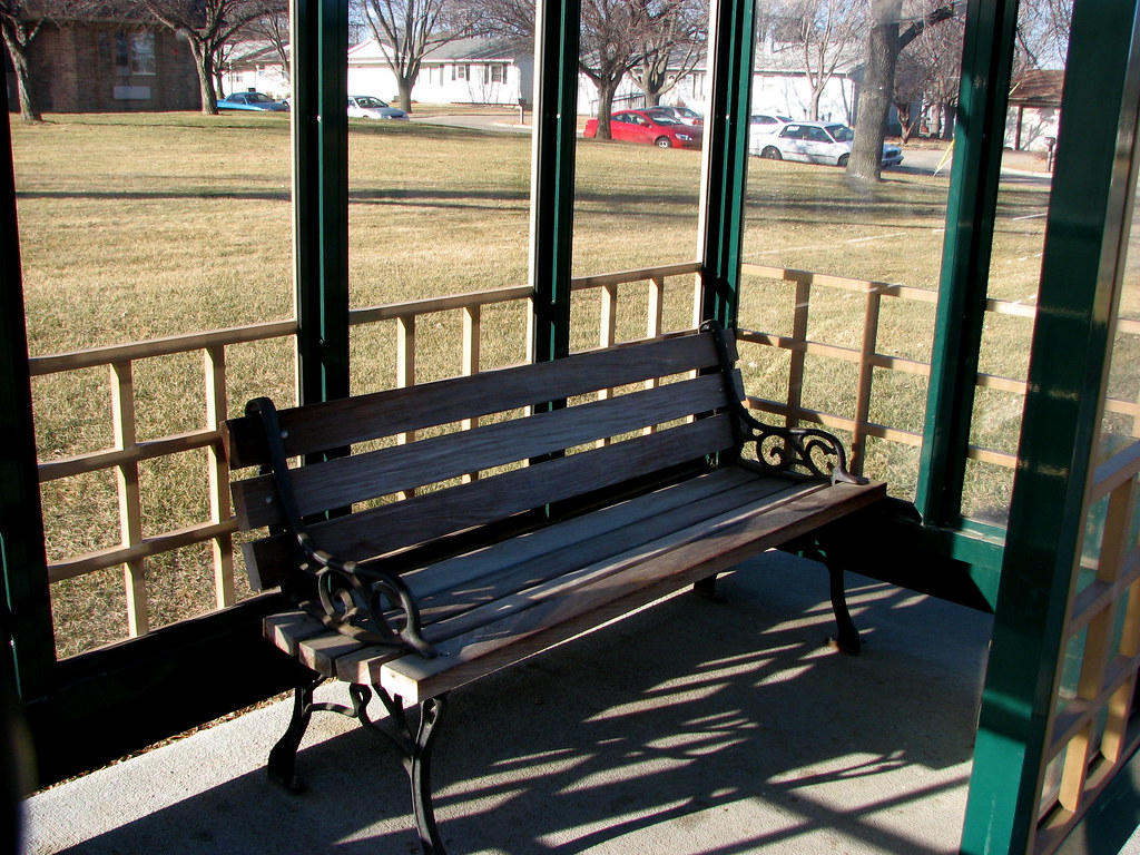 Bench inside the sheltered bus stop by MacSmiley