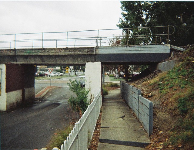 Decrepit bridge, broken sidewalk