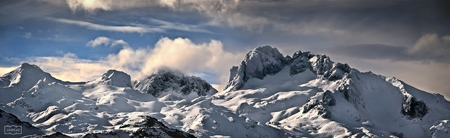 Peñas Santas/ The two main peaks of the occidental massif in Picos de Europa National Park: Peña Santa de Enol, on the right (2.486 m) and Peña Santa de Castilla on the left (in clouds) (2.596 m)