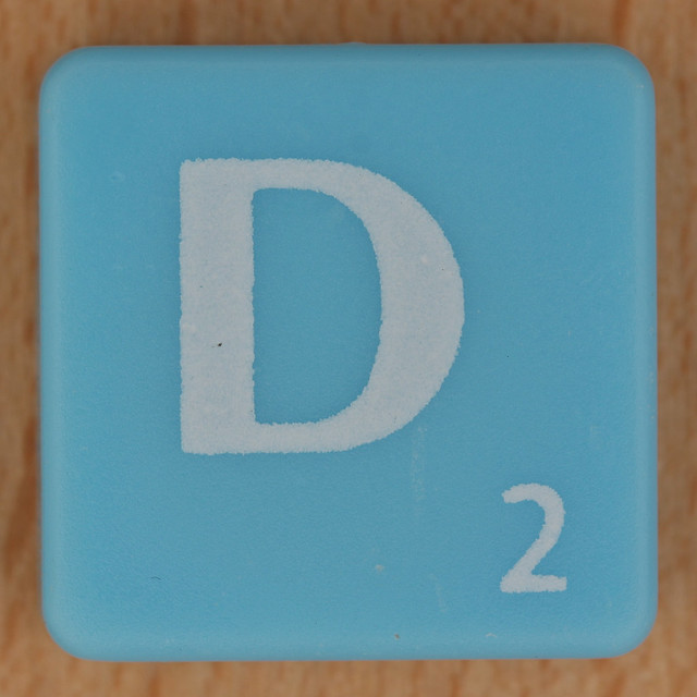 Scrabble white letter on pale blue D