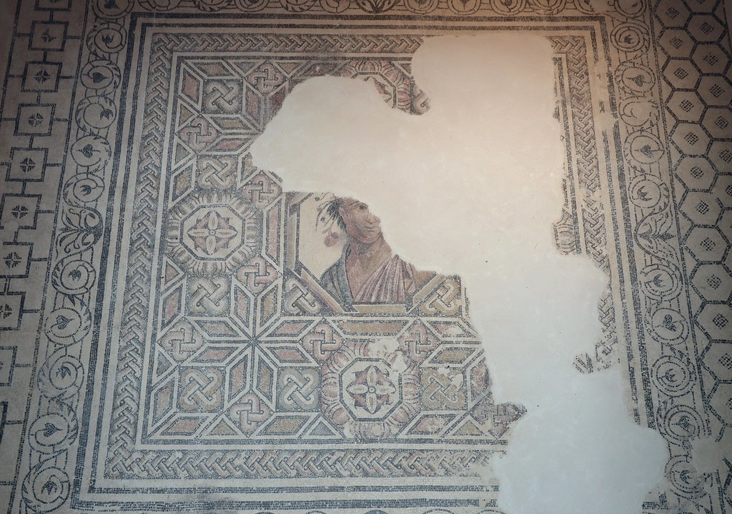 Mosaic floor with a central octagonal medallion portrait, probably an allegory of Spring, that paved the oecus of the Villa del Alcaparral, Roman Mosaic Museum, Casariche, Spain