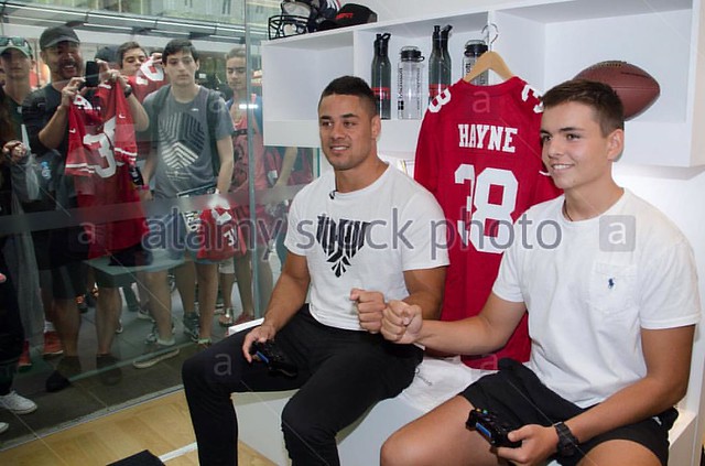 Jarryd Hayne plays the XBOX One game Madden NFL 16 at the Microsoft store in Sydney