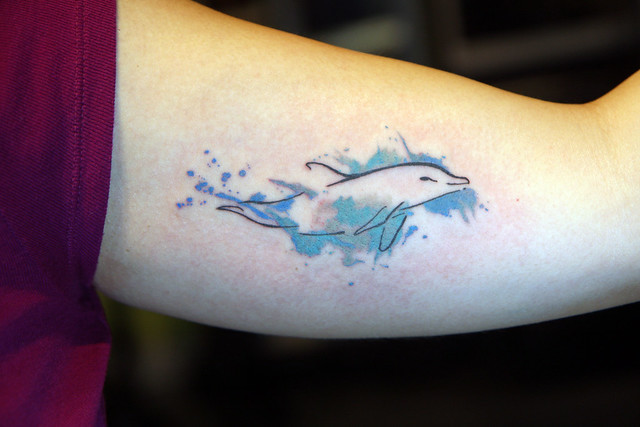 watercolor dolphin tattoo