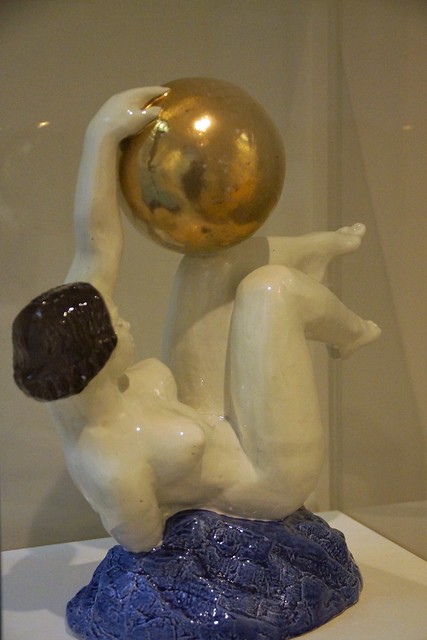 Ivan Semenovich Efimov (1878-1959) Female Acrobat with a Ball, Konakovo faience factory, 1927, underglaze paintwork and gilding on porcelain