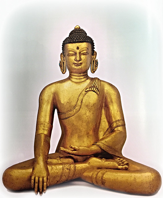 A Golden Buddha in a Lotus Position