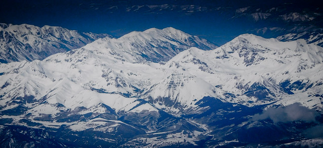 Aerial view of snow capped Rocky Mountains in Colorado