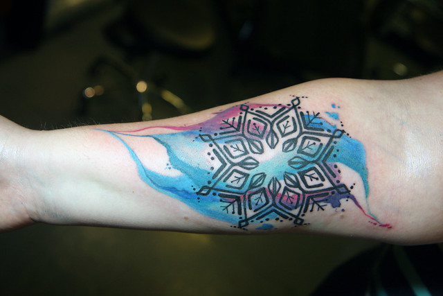 Watercolor snowflake mandala tattoo