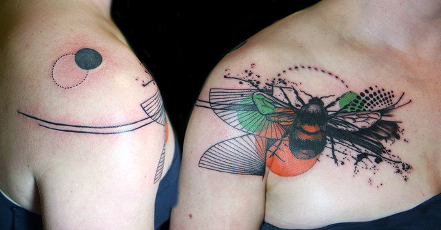 graphic bee tattoo