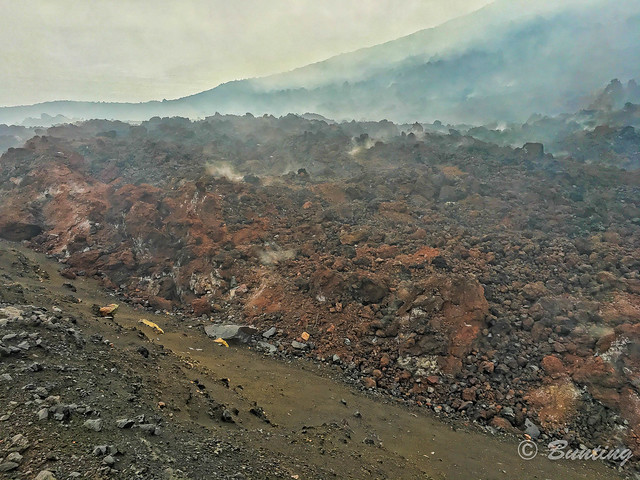 Side eruption of Anak Krakatau - Hot steam / smoke is seeping out.