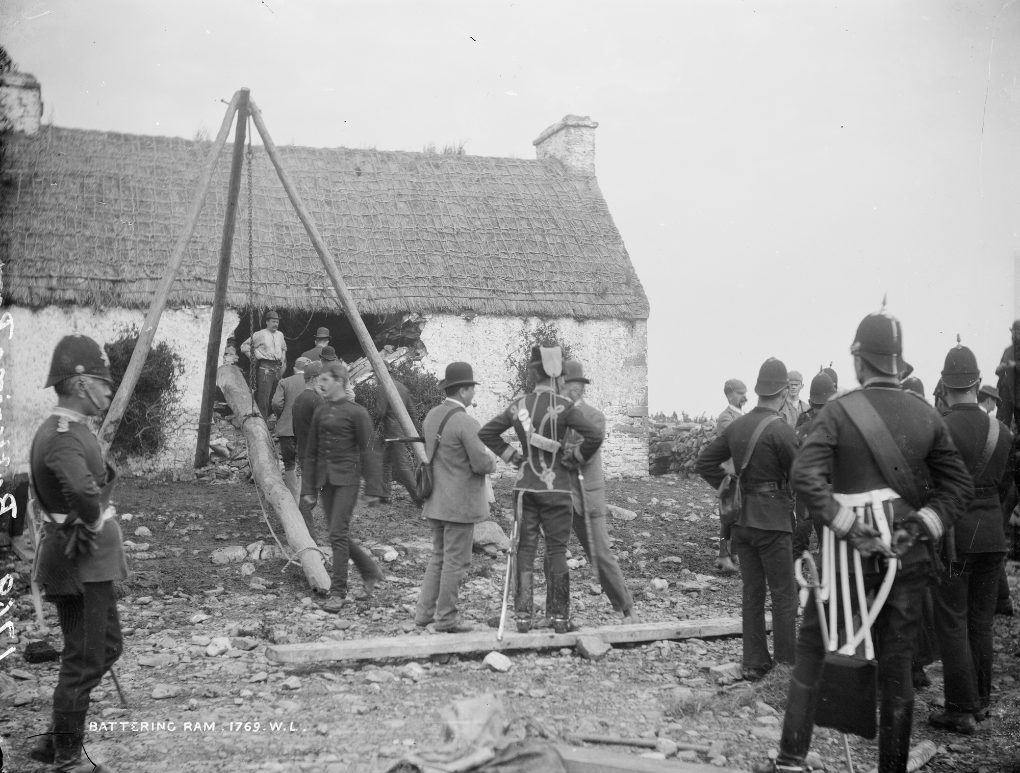 T.Birmingham's house, Moyasta, Co.Clare with Battering Ram and soldiers outside