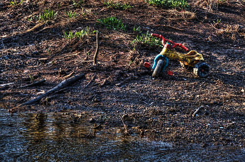 childhood trash river toy lost tricycle dirty pinkfloyd forgotten innocence clarksburg clarksburgwv westforkriver