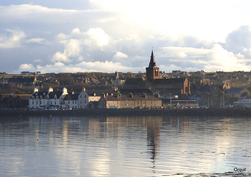 old uk greatbritain houses winter seascape beautiful sunshine skyline buildings reflections skyscape islands bay scotland town seaside nice interesting ancient orkney view cathedral centre shoreline january sunny calm spire attractive ripples cloudscape kirkwall kirk stmagnus ayrehotel romanesquearchitecture royalburgh kirkjuvagr foundedin1137