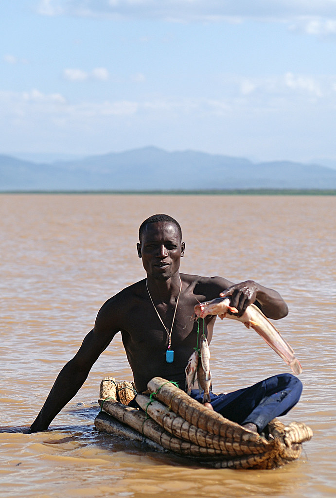 Fisherman on Lake Baringo showing his catch