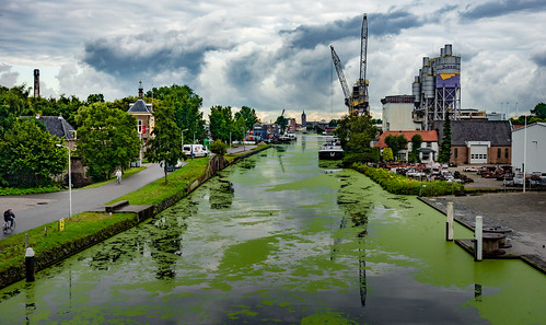 summer sky green church water ship cranes bicycles silos algae van greenwater hss kruithuis nederlandvandaag sliderssunday schieriver