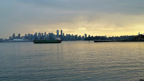 blue winter sunset sea urban canada water yellow skyline vancouver clouds grey scenery downtown waves view skyscrapers harbour britishcolumbia ships pacificocean burrardinlet stanleypark february canadaplace coalharbour waterway highrises