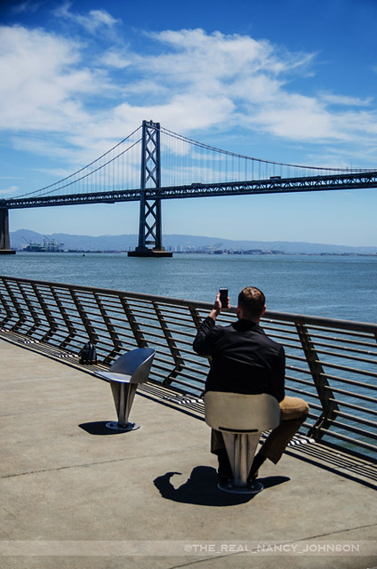 Man at Bay Bridge, San Francisco, California