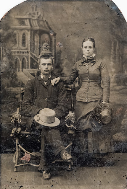 Couple standing ahead of a scenery (tintype, USA)