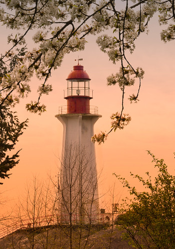 sunset lighthouse wow spring rocks lighthousepark appleblossoms
