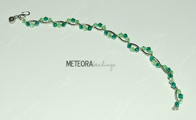 Bracelet - dark and light green beads, with silver seperators