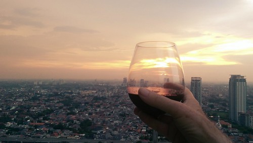 sunset indonesia wine balcony jakarta drinks highrise