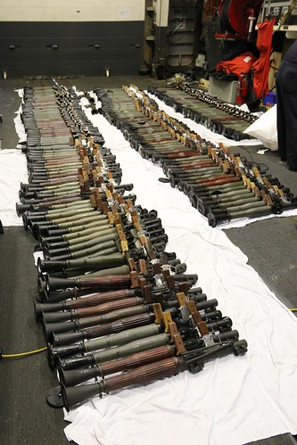 A cache of weapons is assembled on the deck of  USS Gravely. | by Official U.S. Navy Imagery