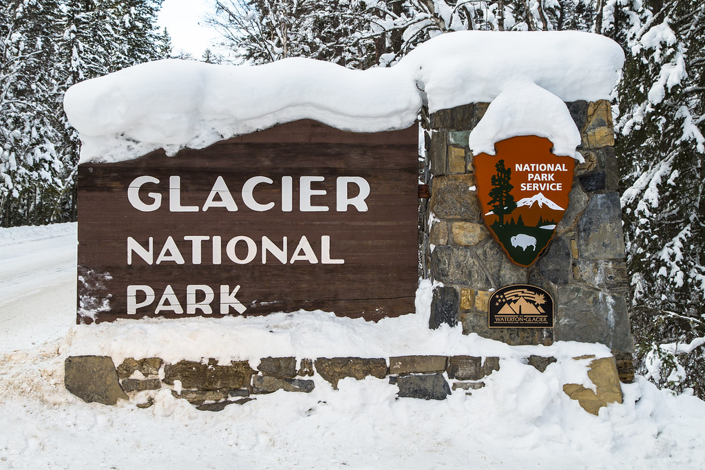 Glacier Entrance Sign in Snow