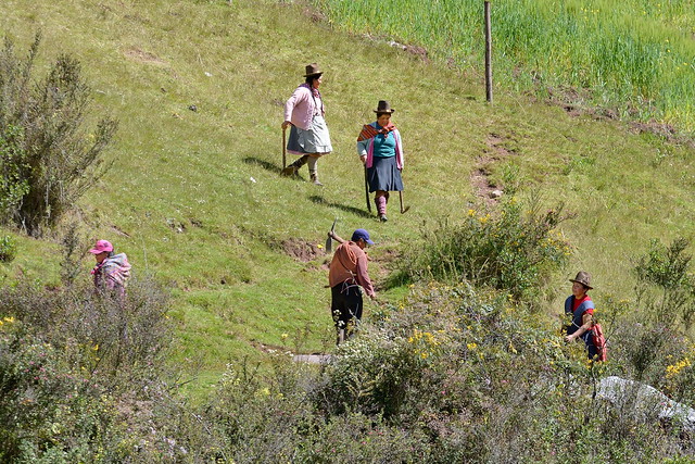 Farmers working in fields at Carved rock at Inca ruins at Killarumiyoq in Peru-33 5-27-15