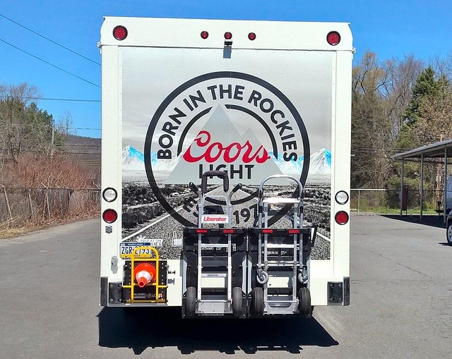 Origlio Beverage Coors Light side-loader beverage truck