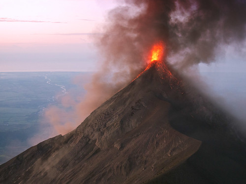 red orange yellow sunrise volcano lava agua purple guatemala hike ash fuego eruption volcan acatenango strombolian